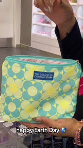 The Cosmetics Company Store Cosmetic light blue and yellow floral pattern Makeup Bag