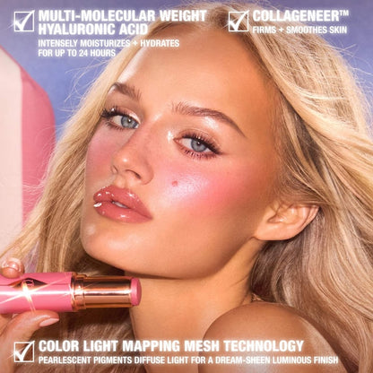 Charlotte Tilbury 
Unreal Lip + Cheek Glow Blush Stick with Hyaluronic Acid