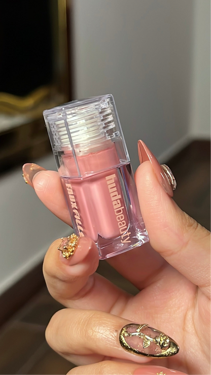 HUDA BEAUTY 
Faux Filler Shiny Non-Sticky Lip Gloss Mini 1.9ml