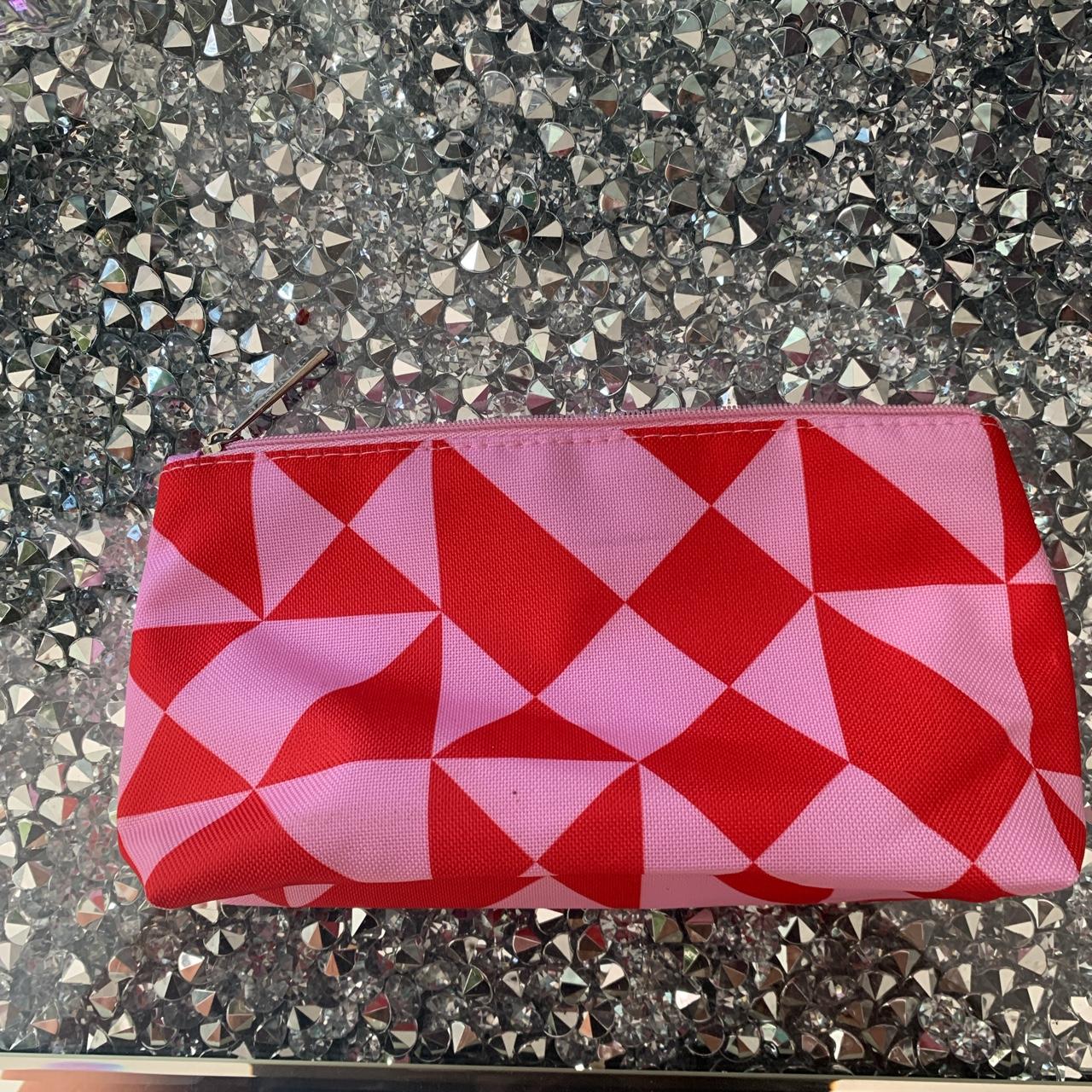 Clinique vibrant pink and red geometric pattern cosmetic bag